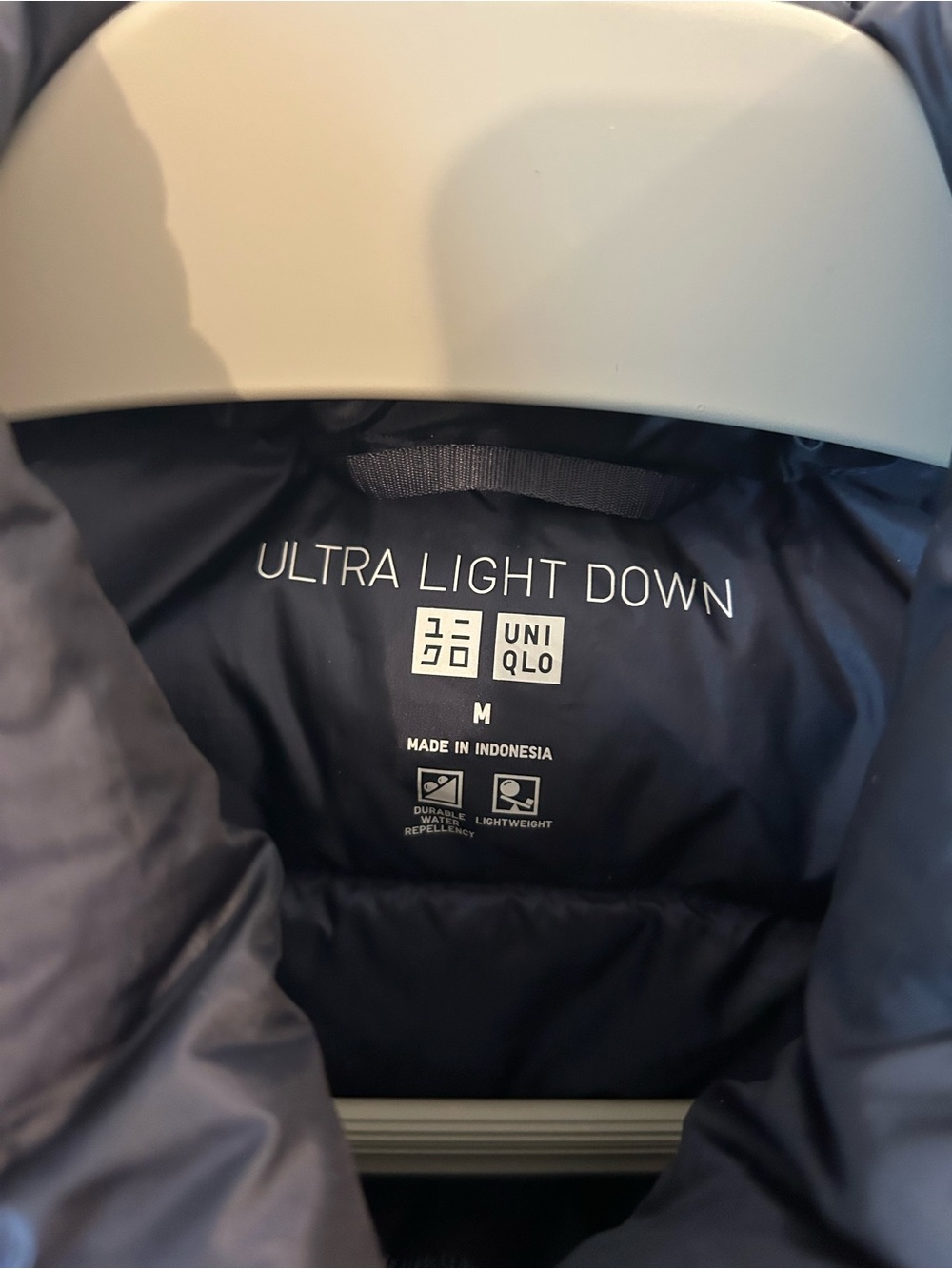 Uniqlo ultra light down vest in navy - Picture 2 of 3